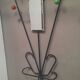 Wall-mounted coat rack with colored balls