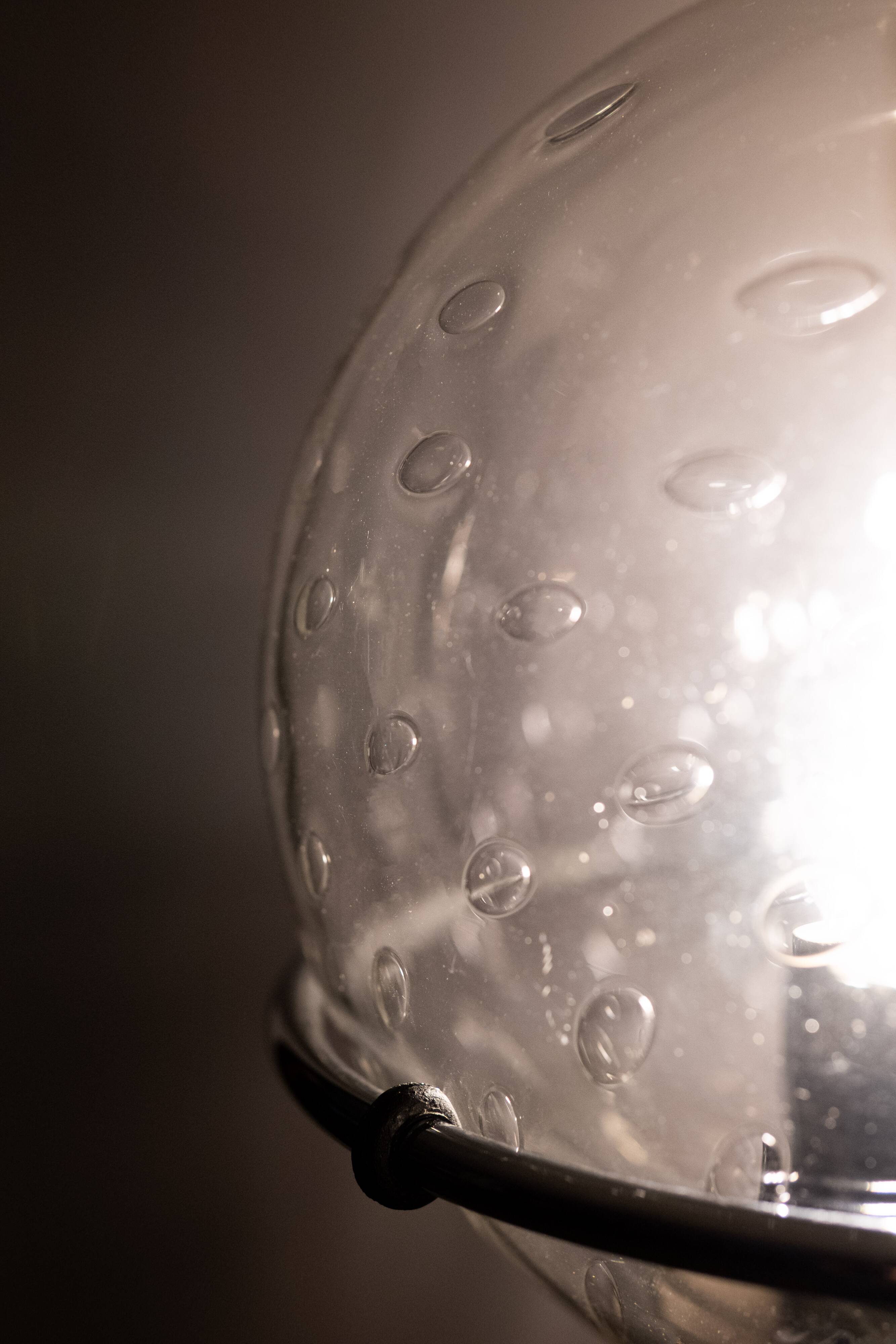 set Basket-Globe wall lamps with raindrop glass bowl by Raak, 1970s