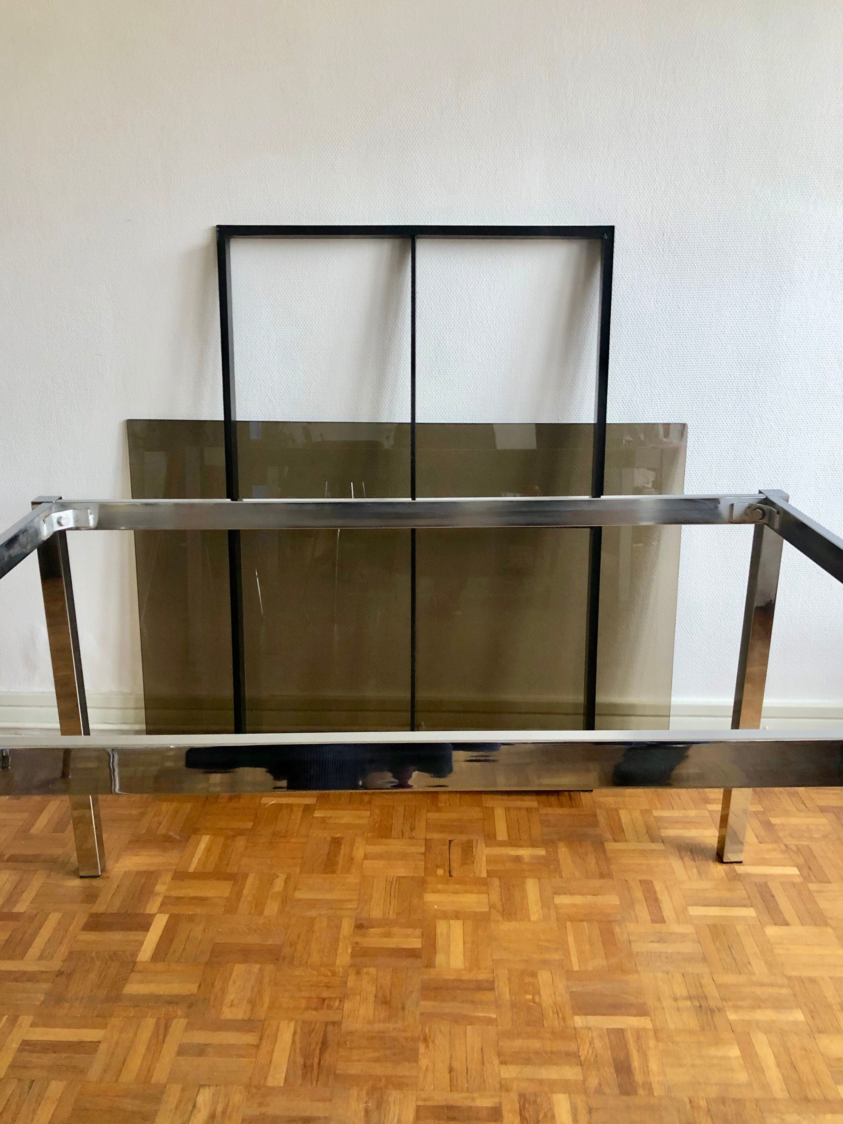 Glass and chrome metal dining table