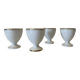 Set of 4 vintage egg cups in white porcelain with a gold rim.