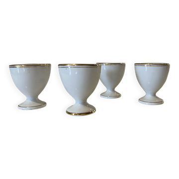 Suite de 4 coquetiers vintage en porcelaine blanche et liseré doré