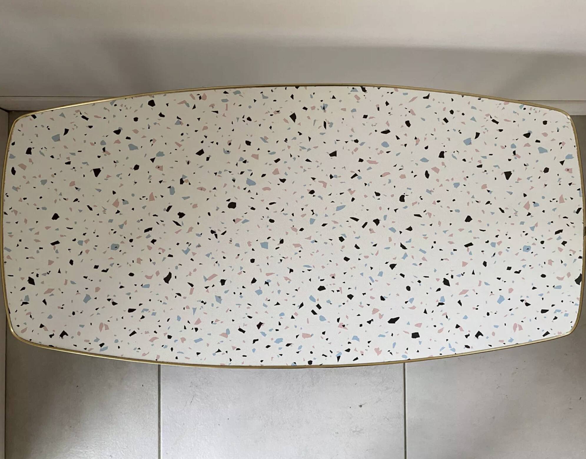 Formica/Terrazzo coffee table with brass compass legs