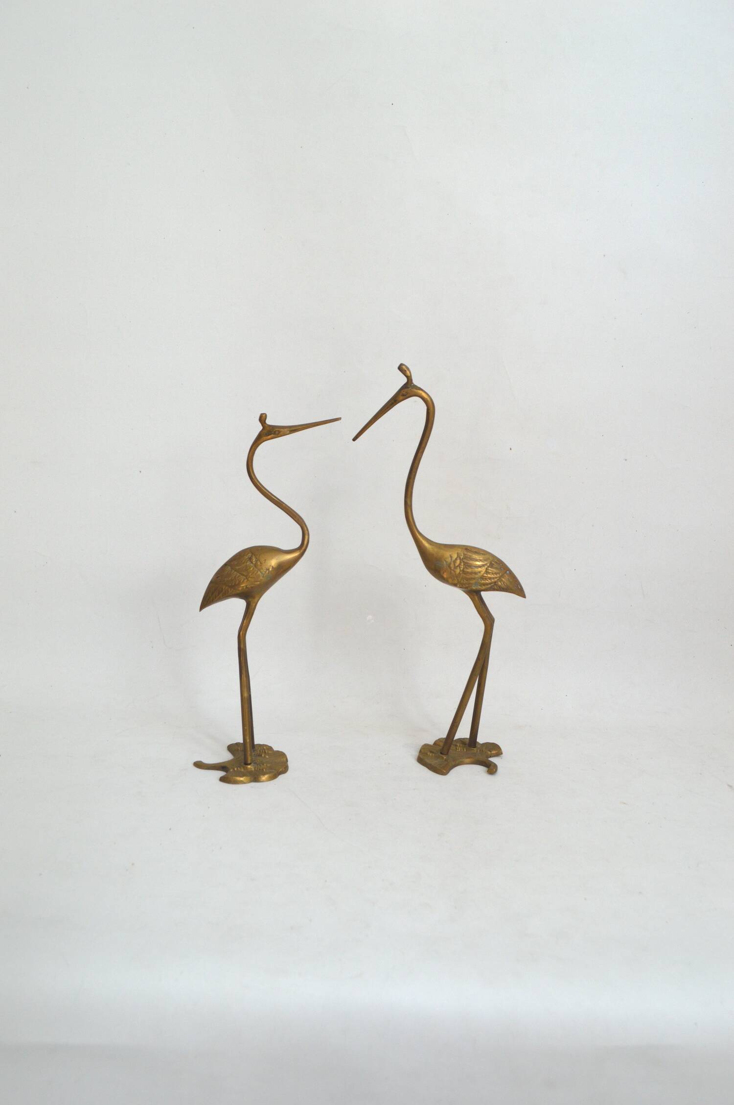 Couple of brass birds