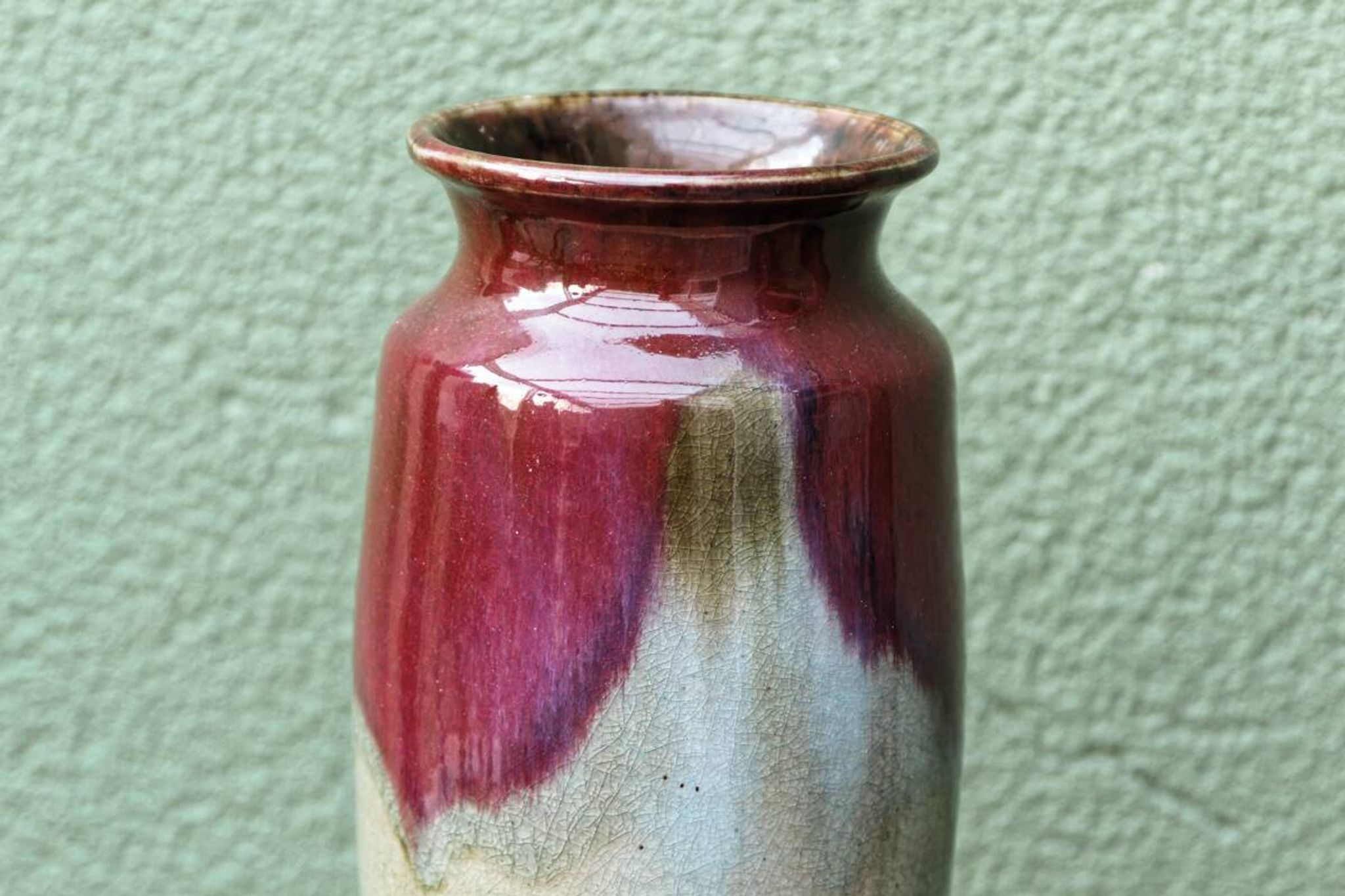Glazed stoneware vase, signed, oxblood