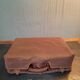 Red leather suitcase