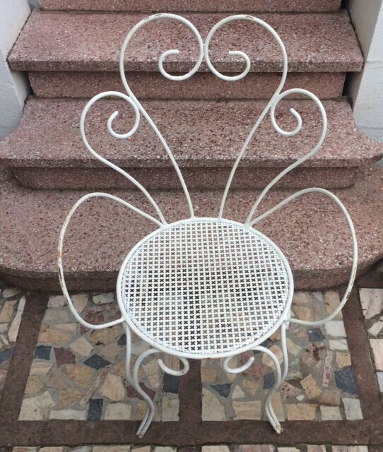 2 armchairs & 2 chairs, wrought iron1950