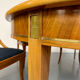 Round walnut Napoleon III extendable table with bronze top in good condition.