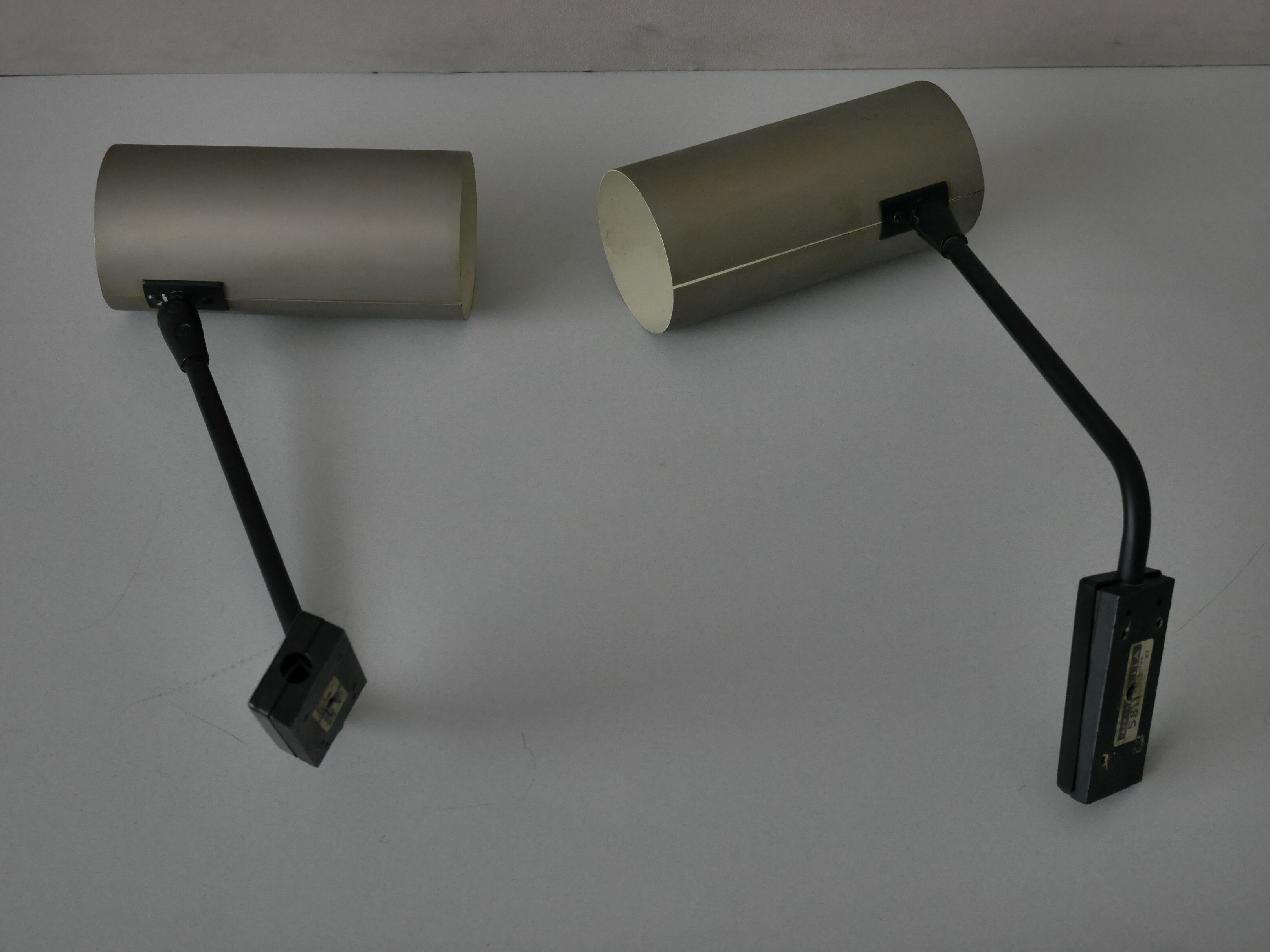 Pair of articulating Lita wall lamps