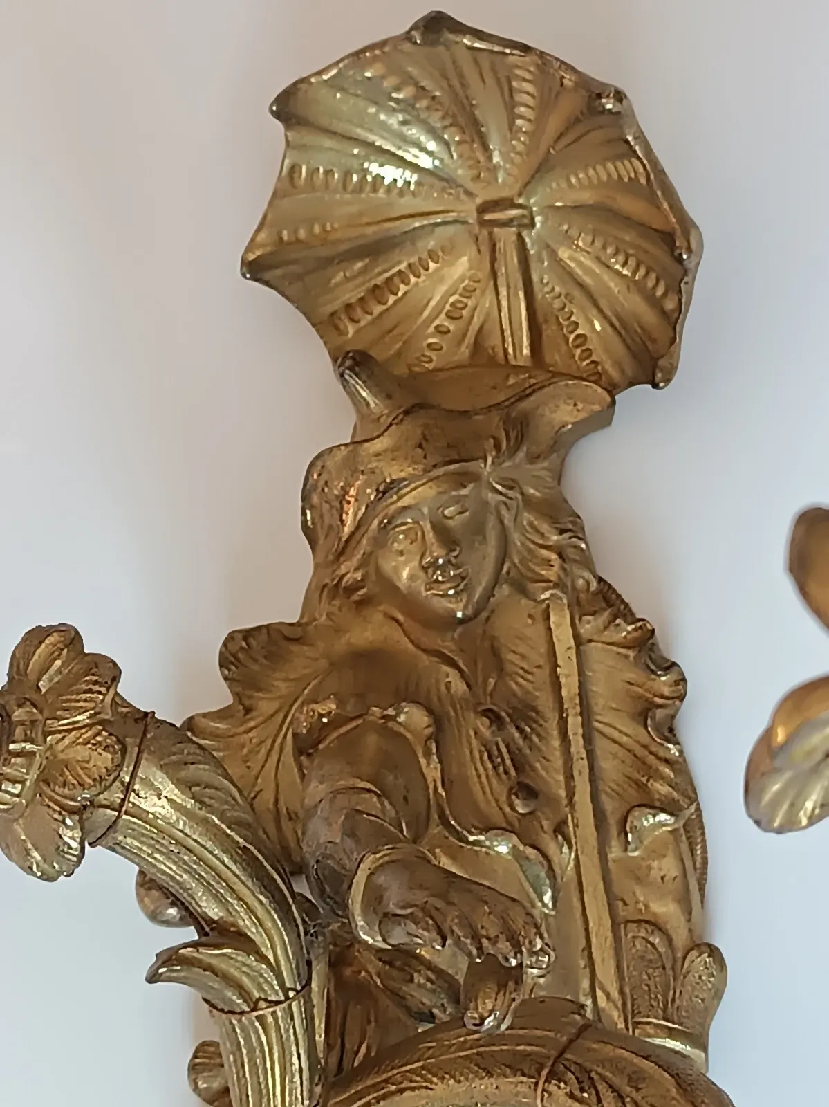 Pair of Régence style wall sconces in gilded bronze