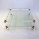 Coffee table in plexiglass, brass and glass top, 1980.
