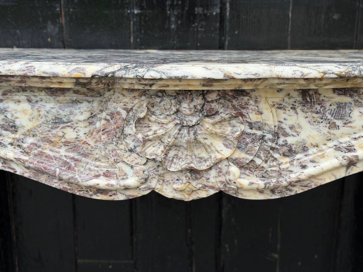 Louis XV style fireplace in Brocatelle marble, circa 1880.