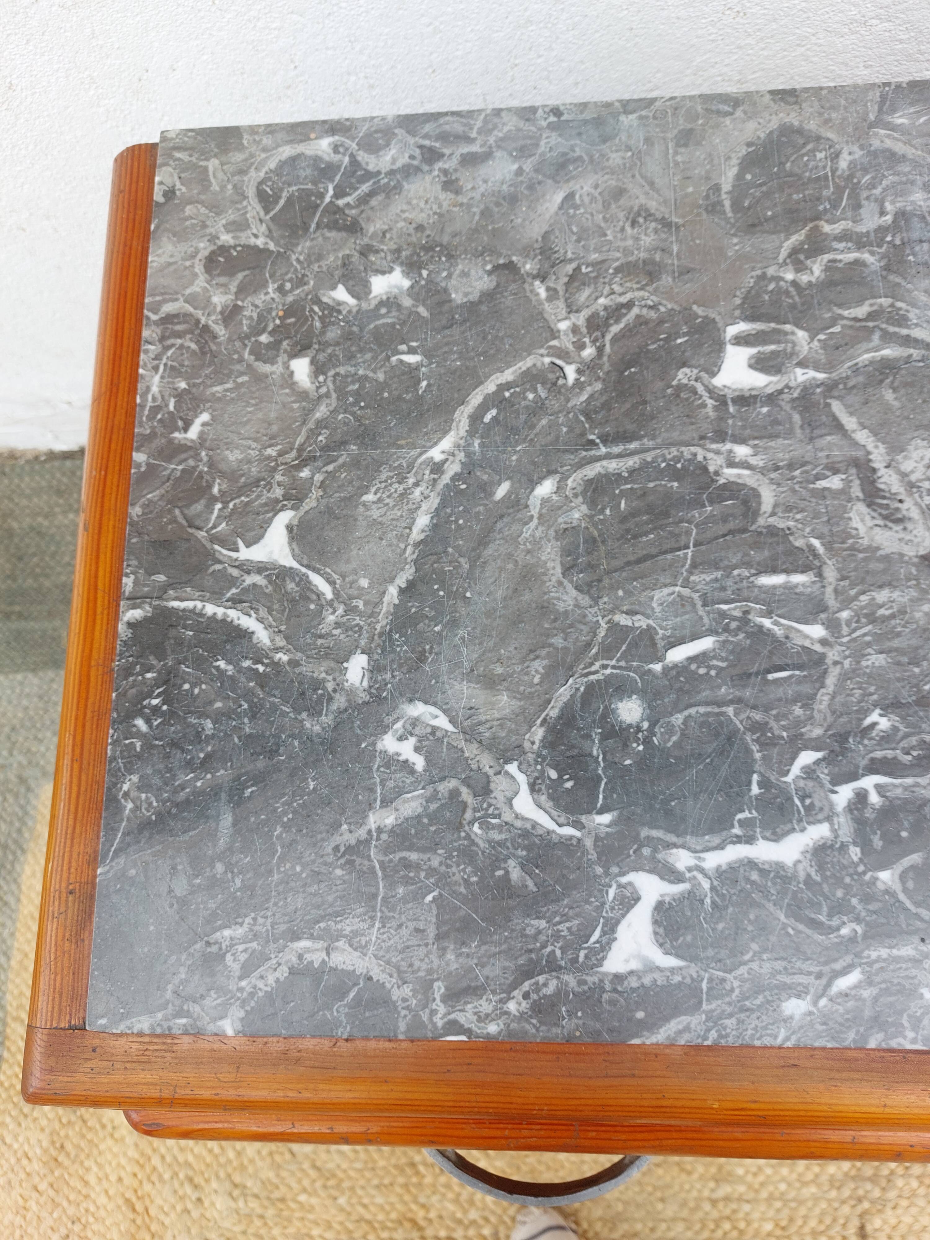 Mado buffet, marble top and asymmetrical doors.