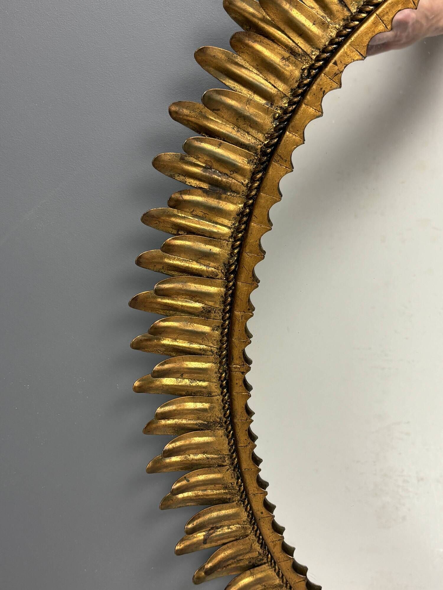 Midcentury bohemian Hollywood Regency Spanish gilt metal sun mirror, 1960s