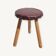 Leather-upholstered tripod stool