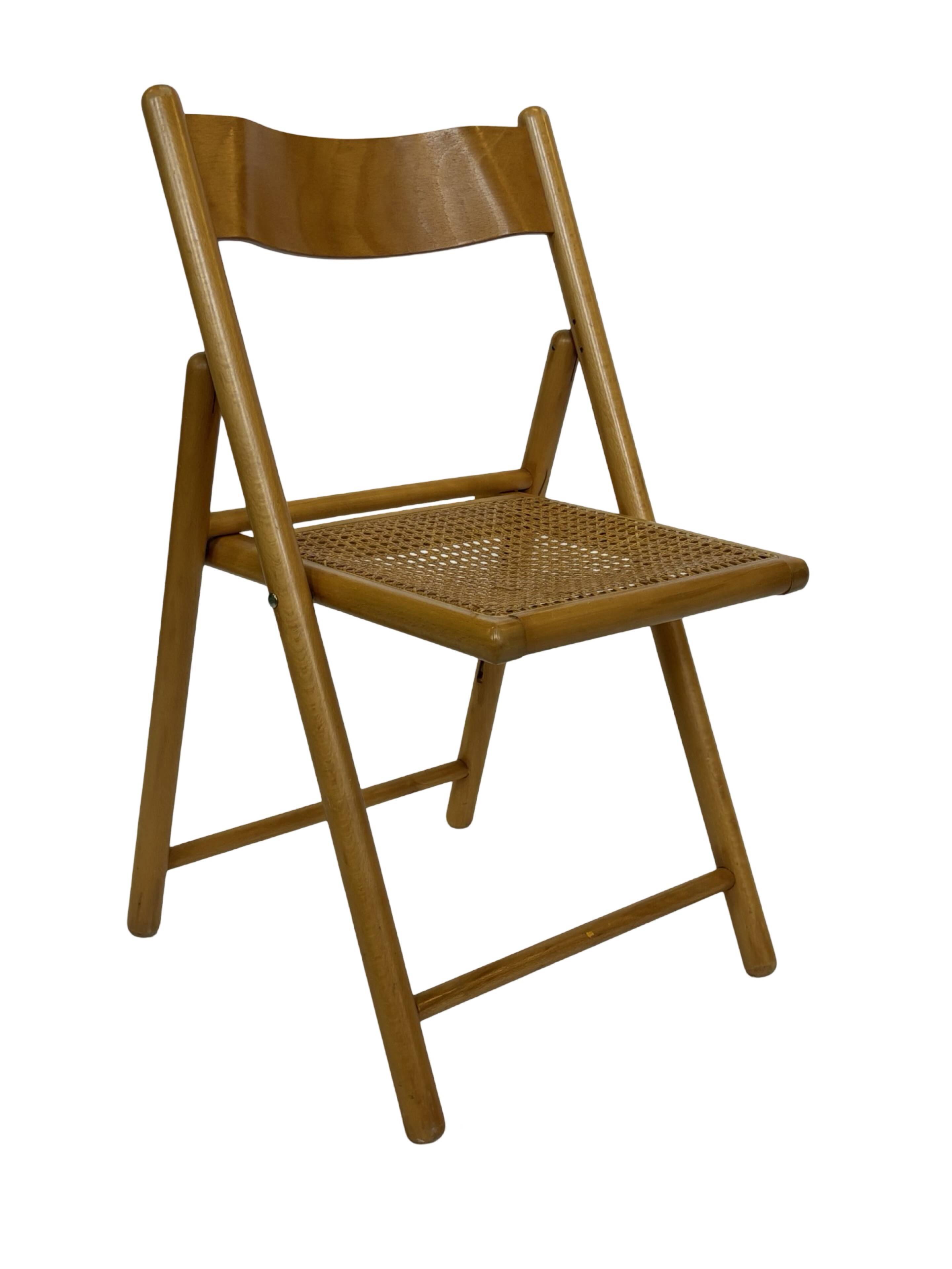 Vintage wooden folding chair with rattan seat 80s minimalist design