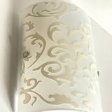 Polished and screen-printed glass sconce by eglo