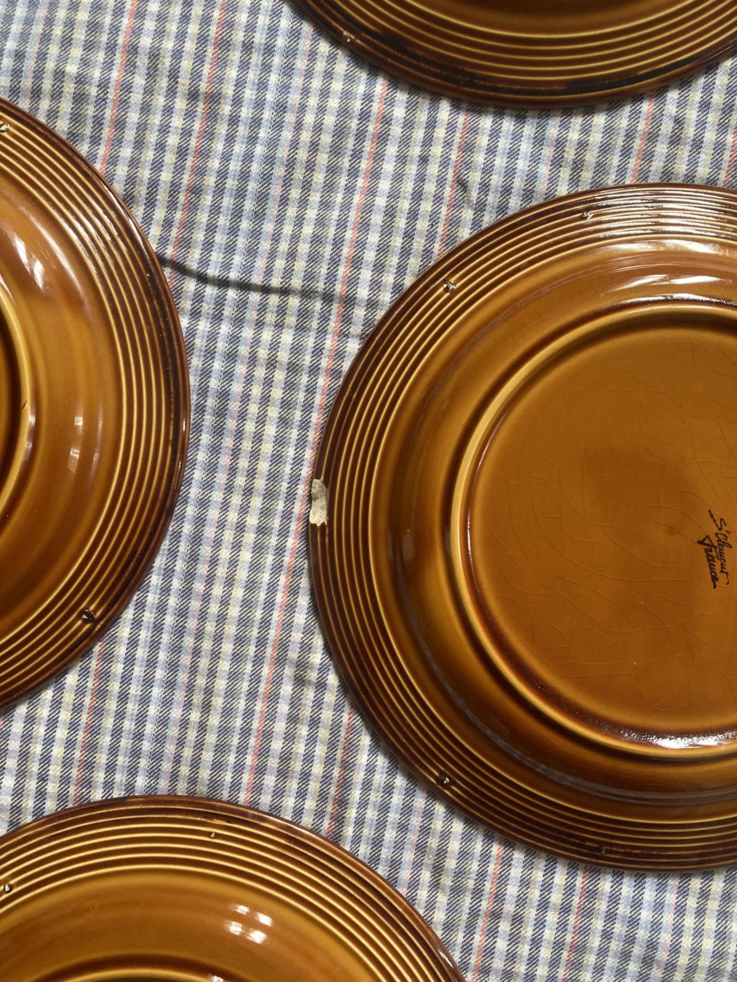 7 flat plates in earthenware Saint Clément vintage brown