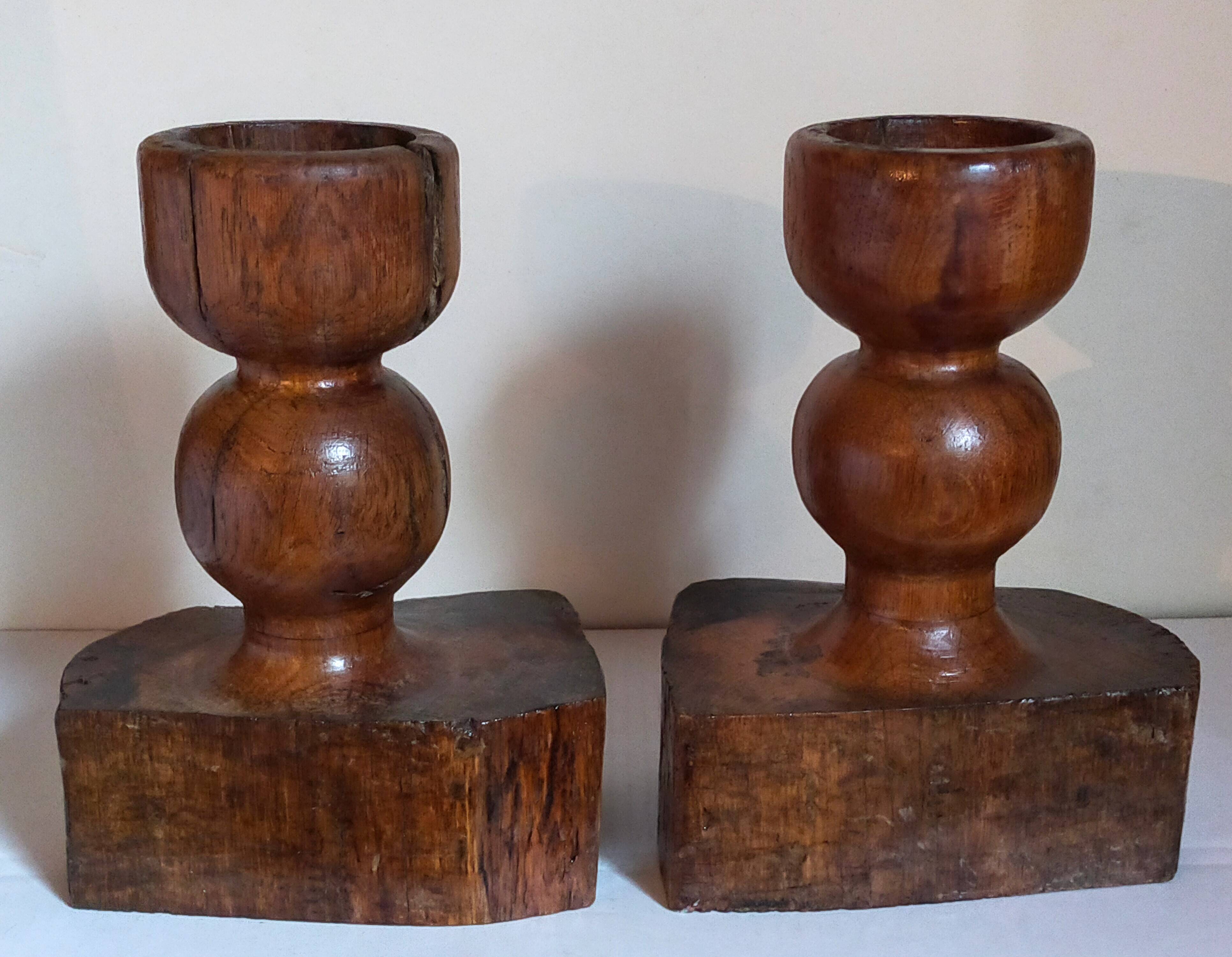 Pair of old brutalist turned solid wood candlesticks