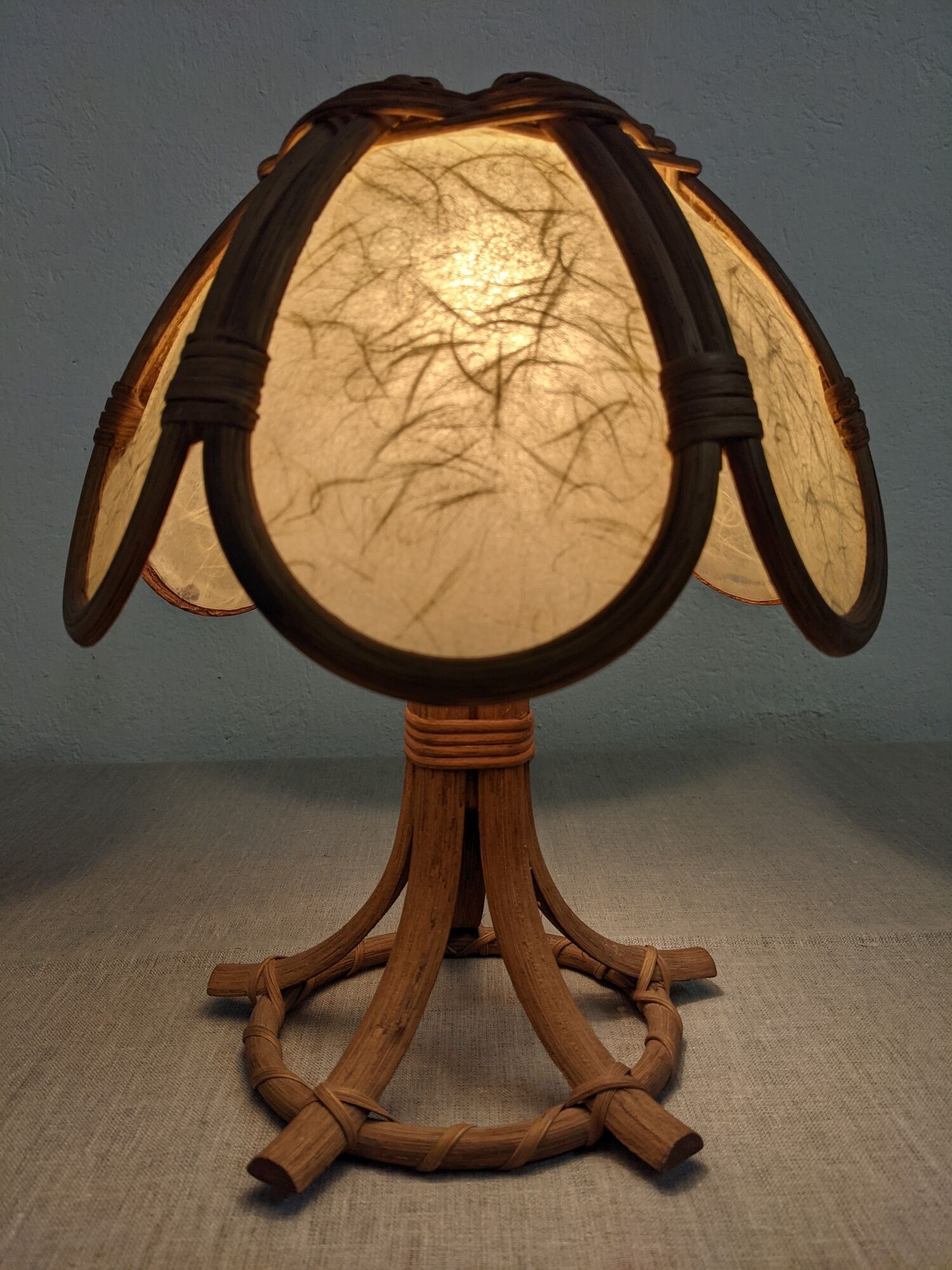 Lotus flower bedside lamp in skin and rattan from the 60s/70s