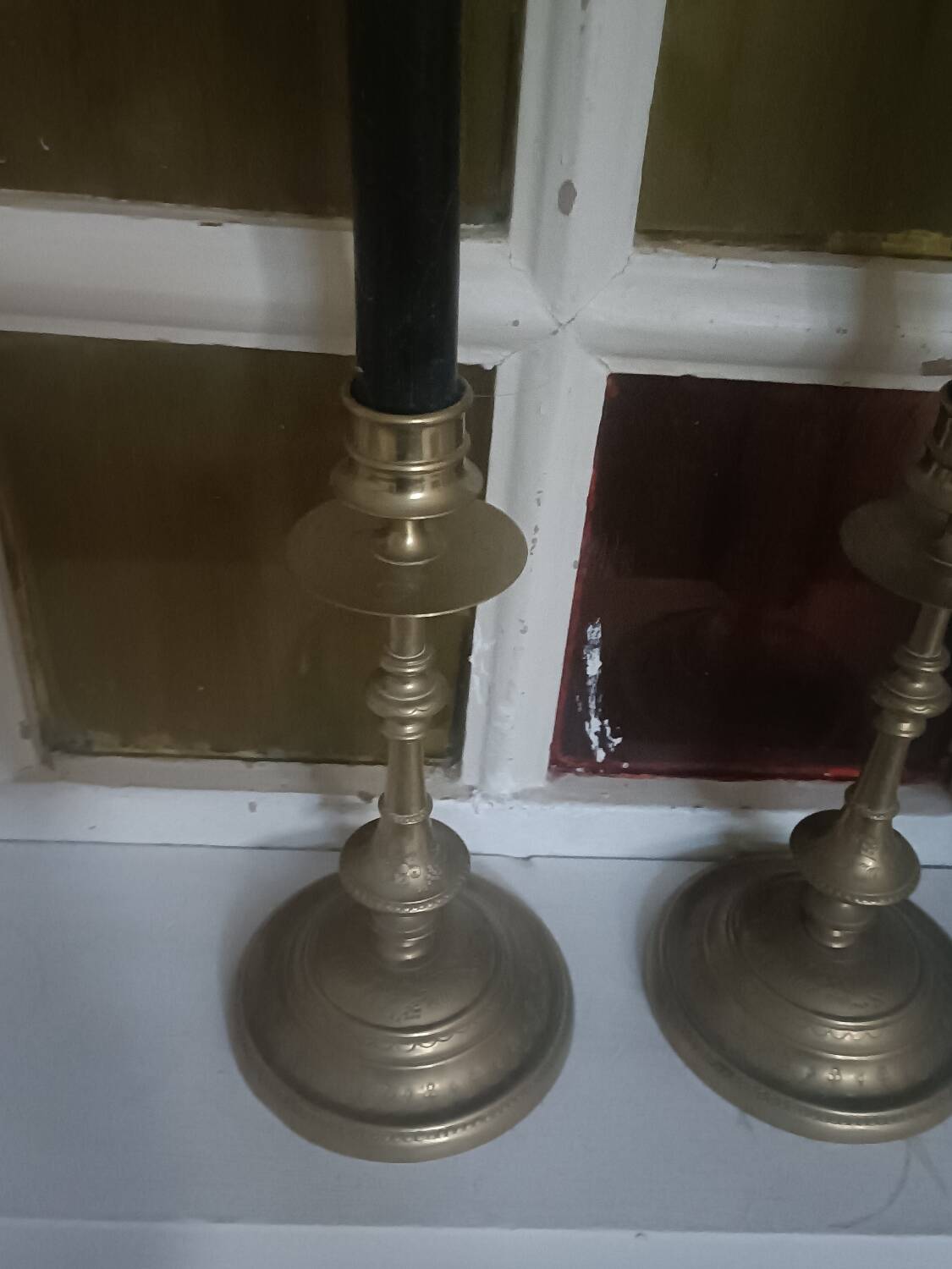 Pair of chiselled candlesticks