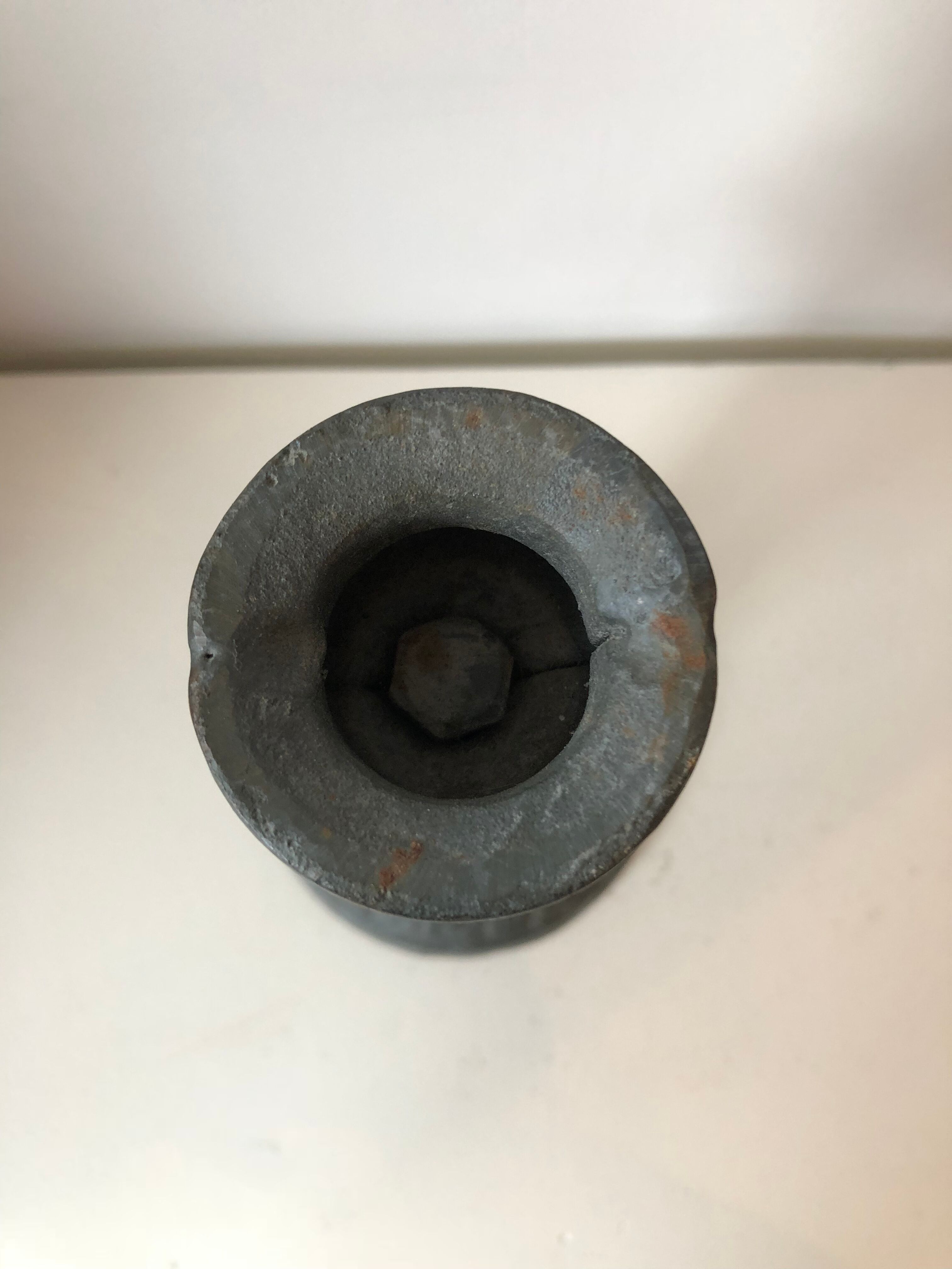 Old cast iron candlestick