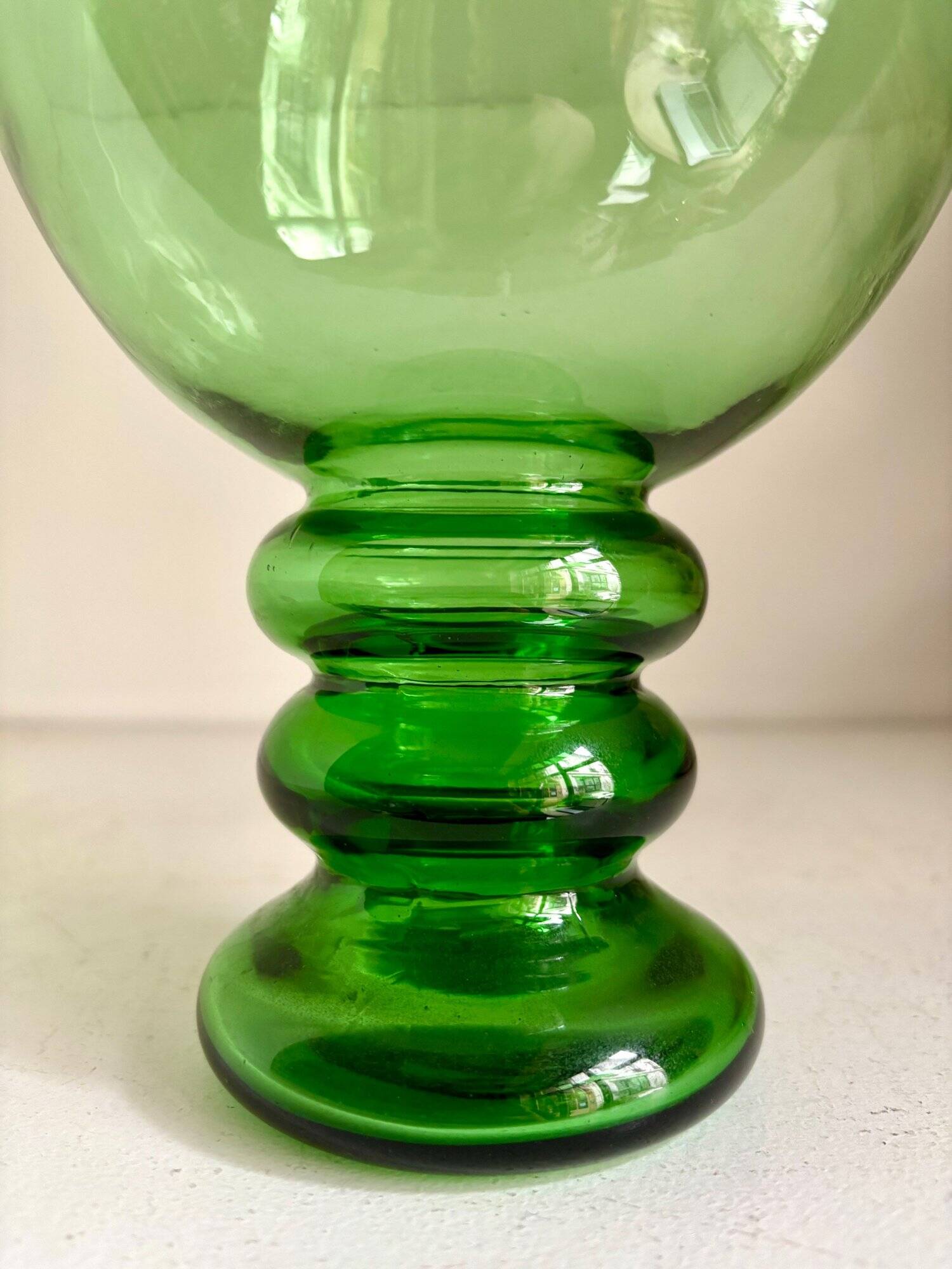 Green glass ball vase