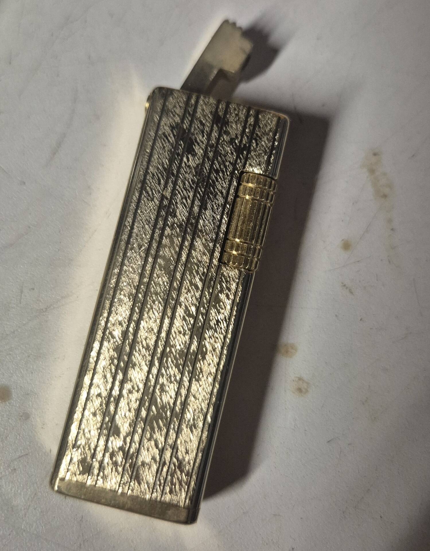 Vintage Scorpio gas lighter in its collector's case.