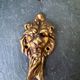 4 lion coat hooks in solid brass Art Nouveau