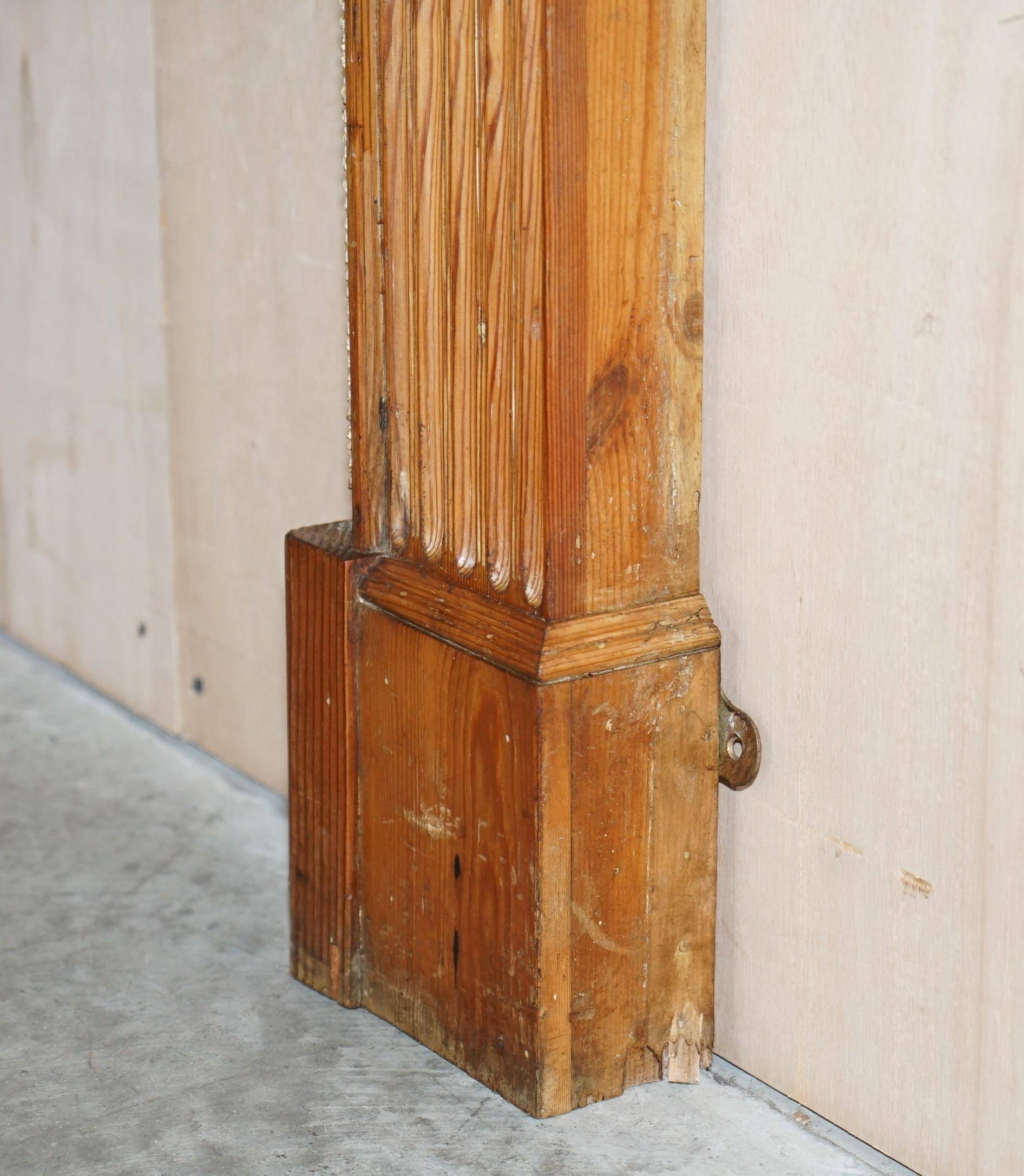 Victorian antique fireplace in tarred pine and sculpted gesso.
