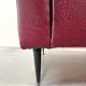 Vintage burgundy armchair, compass base in black metal and brass