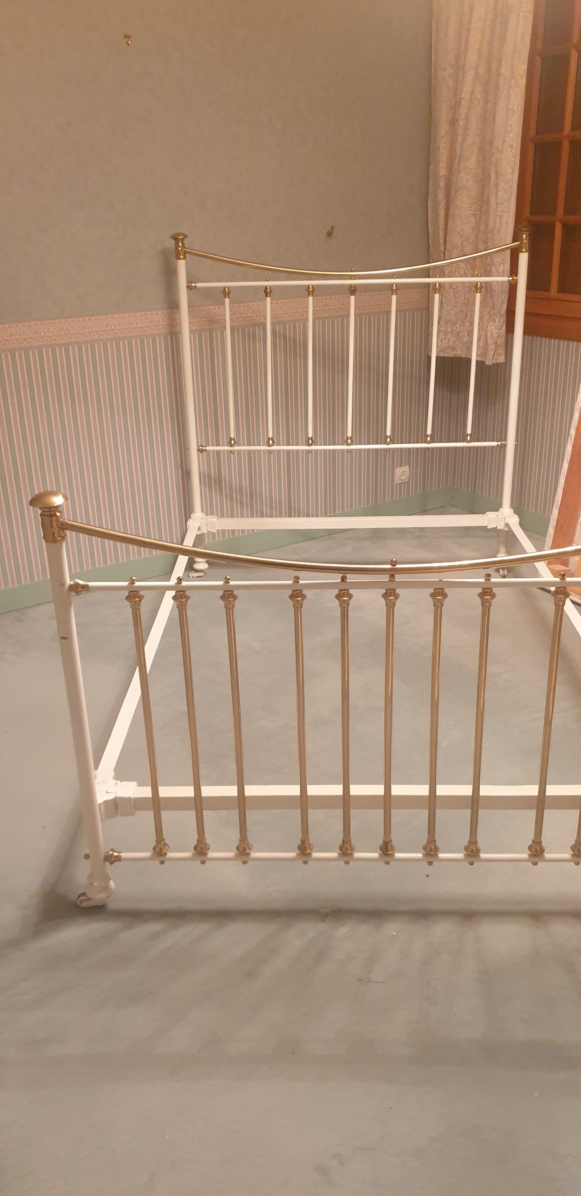 Restored old iron bed