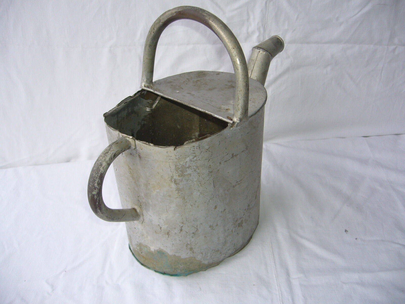 Old zinc watering can