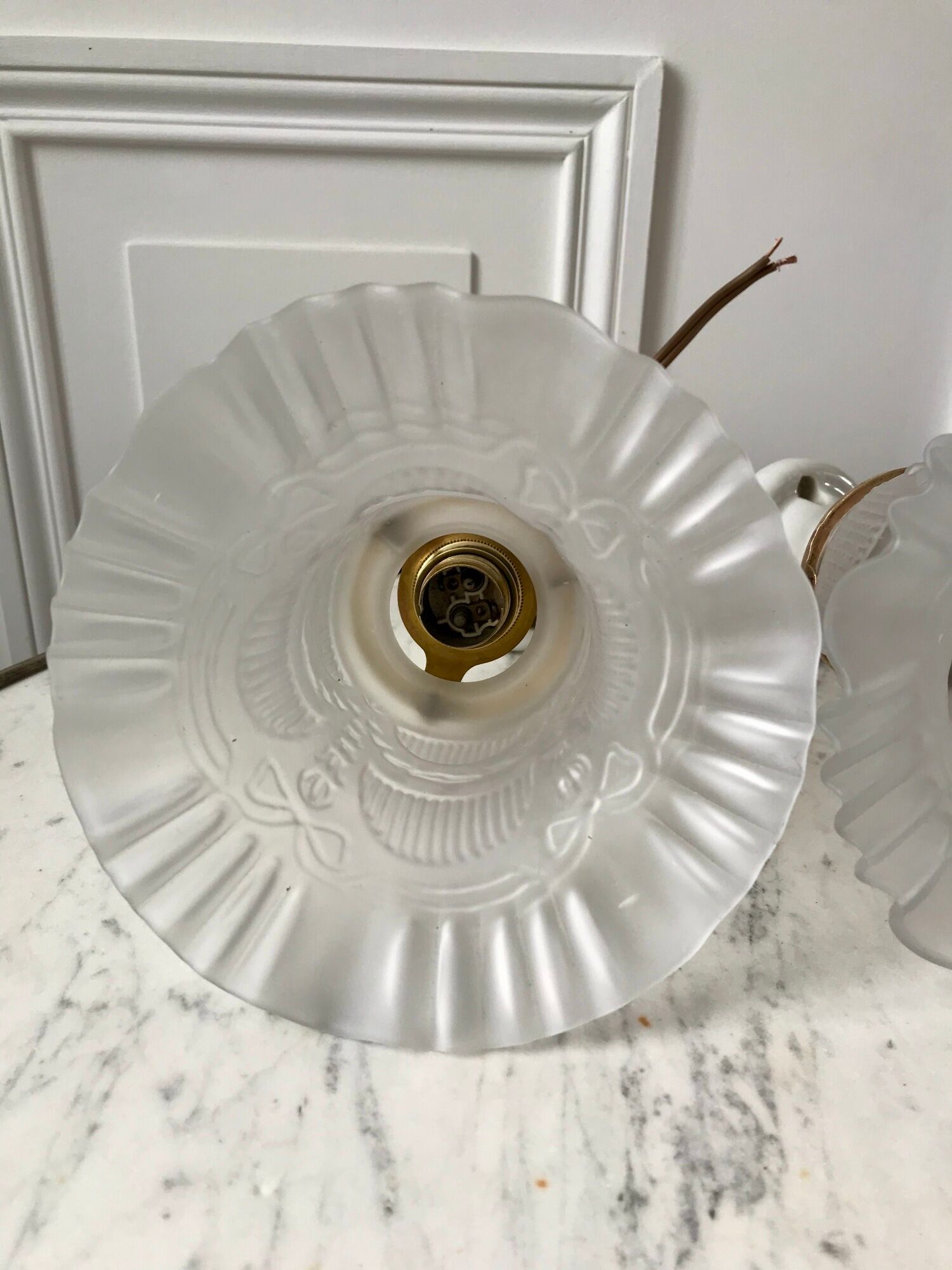 Pair of tulip wall lamps in molded glass on porcelain support 20s
