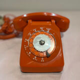 Orange vintage phone with socotel dial