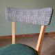 Green bistro chair with houndstooth pattern