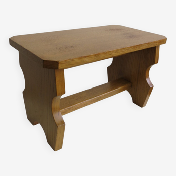 Small wooden footrest stool