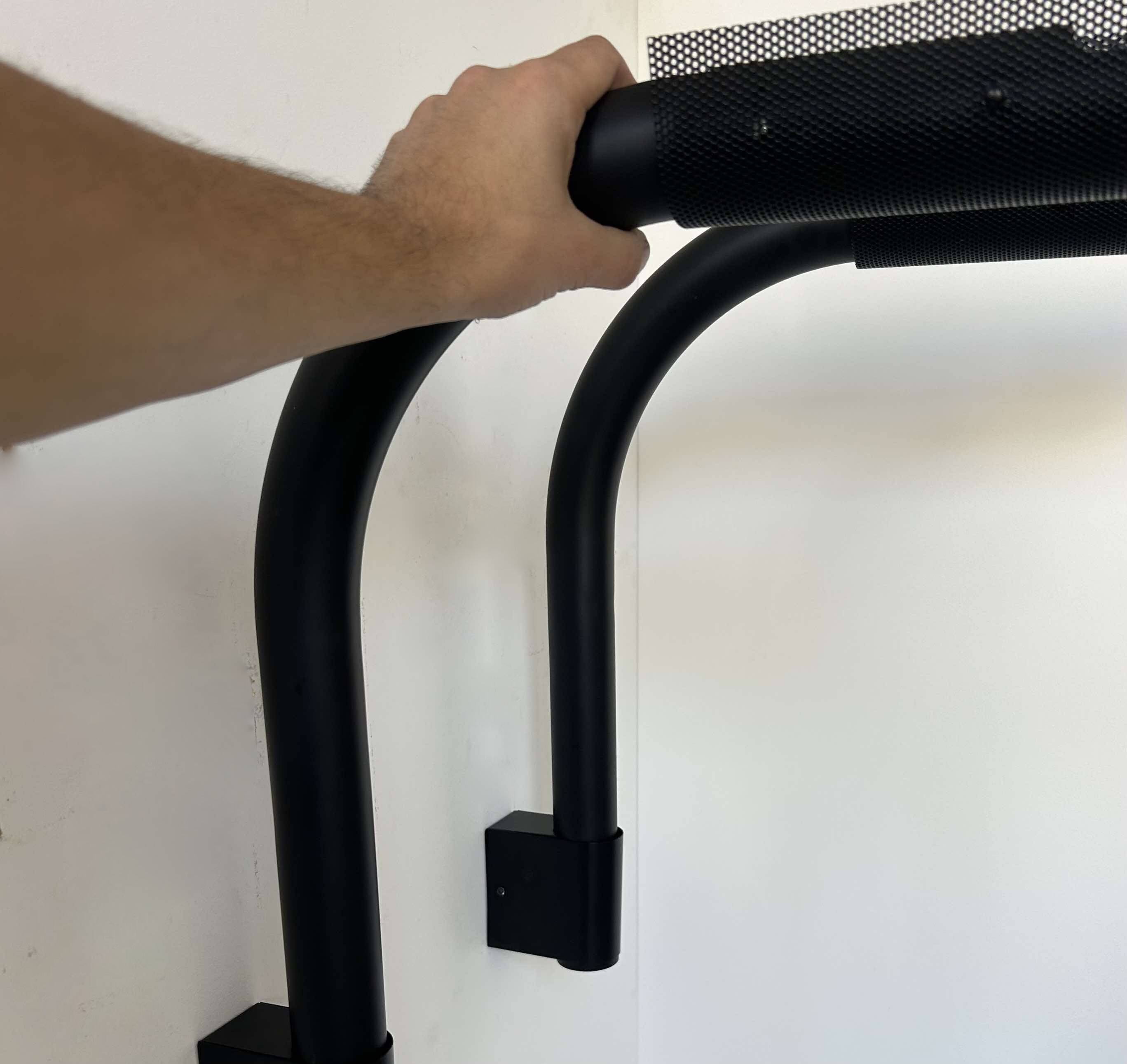 Pair of vintage wall lights, tubular and perforated black metal, Parscot France 1980