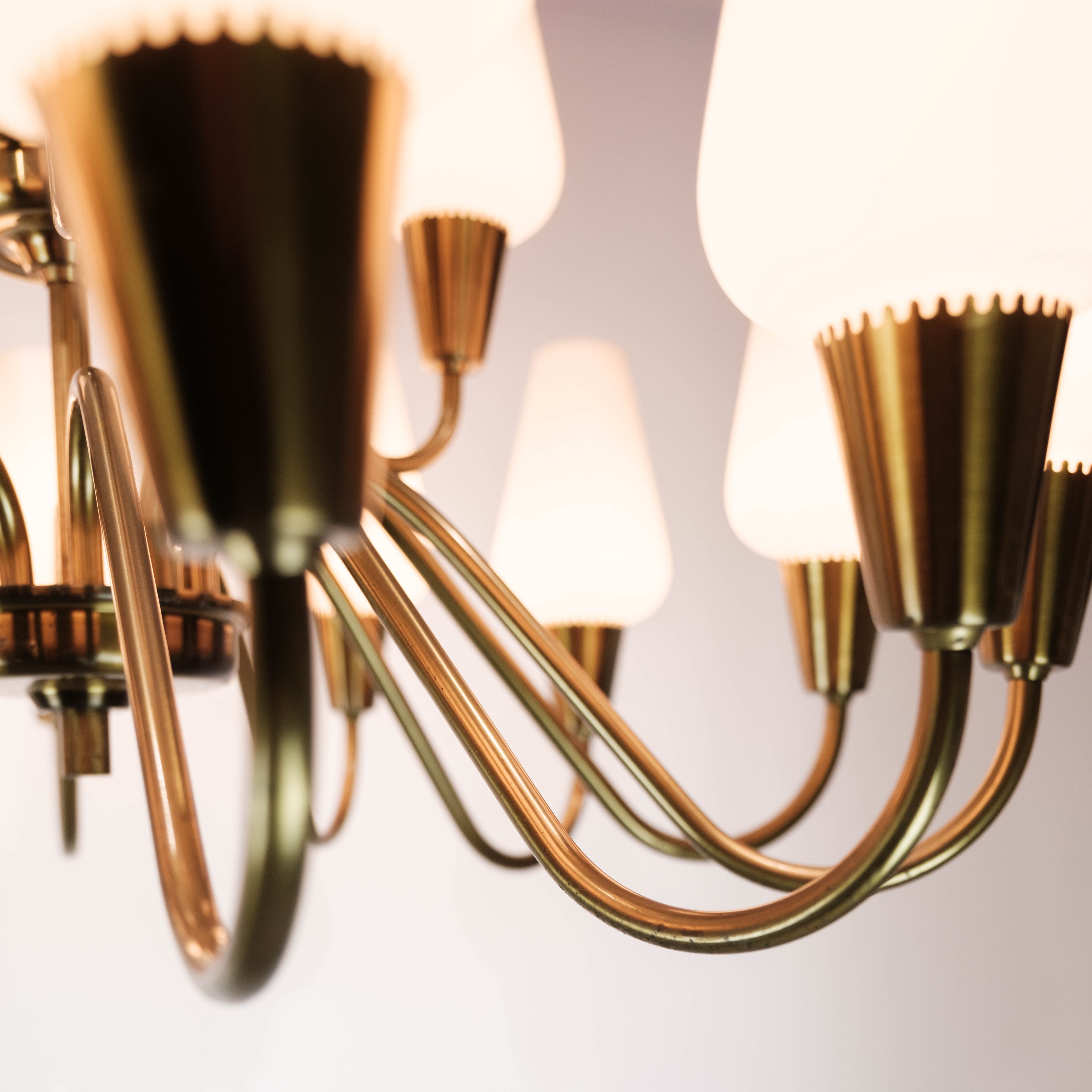 Lamp with arms of brass and glass, of Danish design from the 1950s