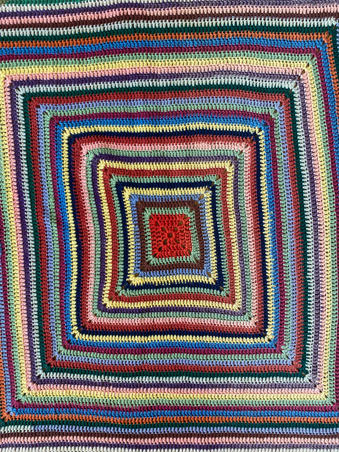 Hand crocheted wool blanket plaid