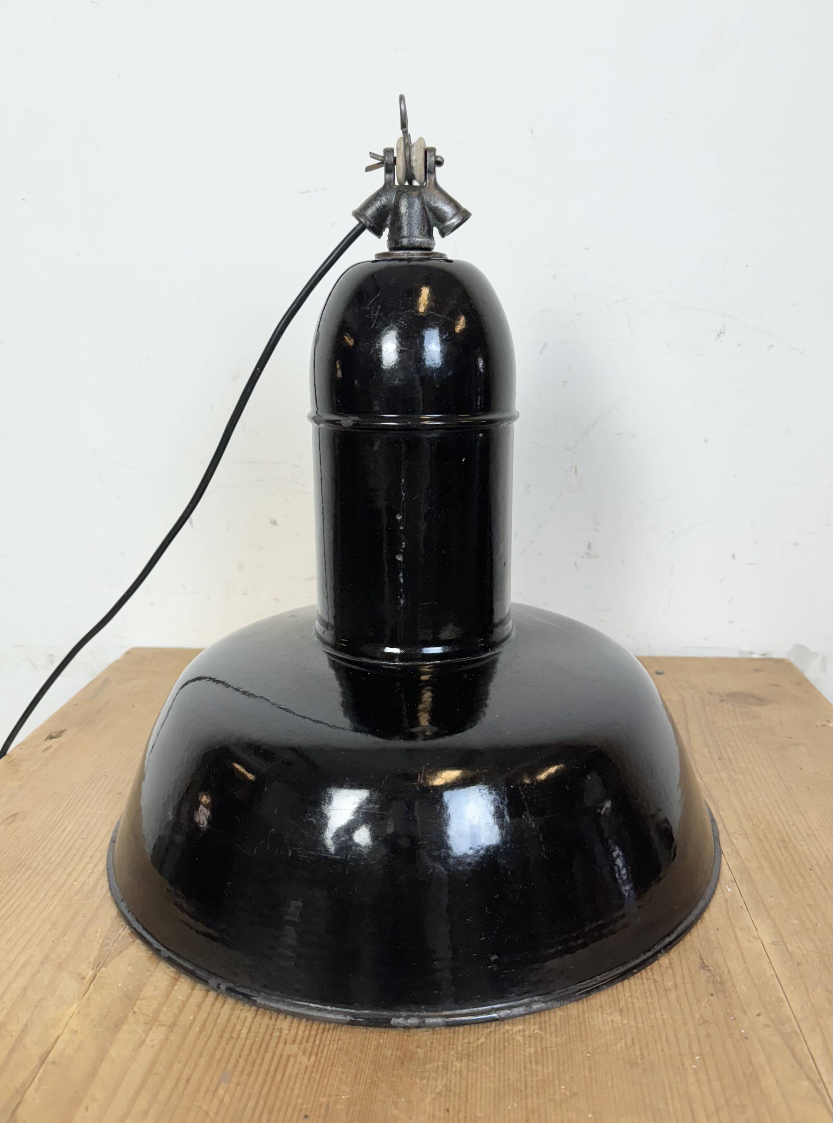 Industrial Black Enamel Factory Lamp with Cast Iron Top, 1930s
