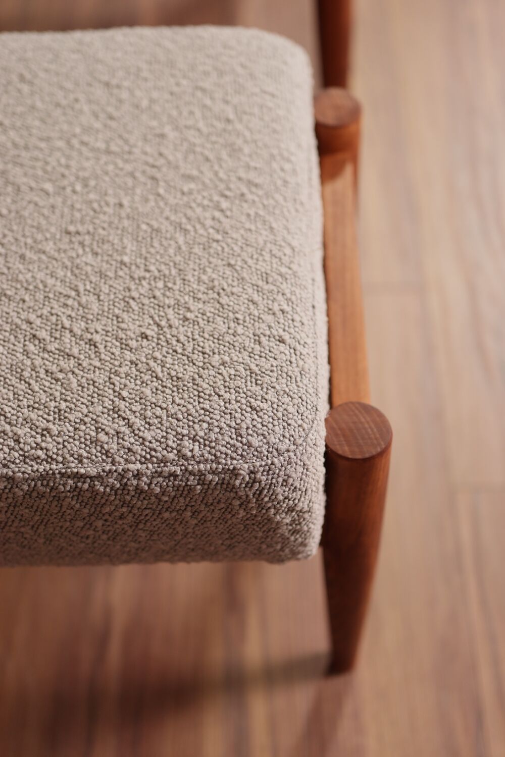 Armchair and ottoman in boucle fabric by H. Lis