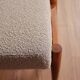 Armchair and ottoman in boucle fabric by H. Lis