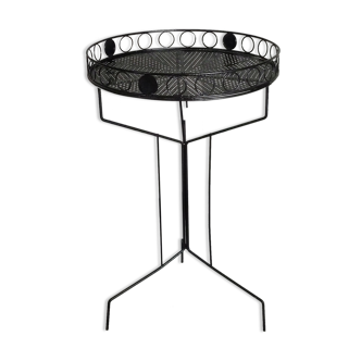 Wrought iron table with perforated top