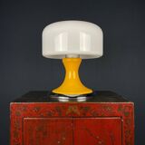 Mid-century Italian yellow table lamp from the 1970s.