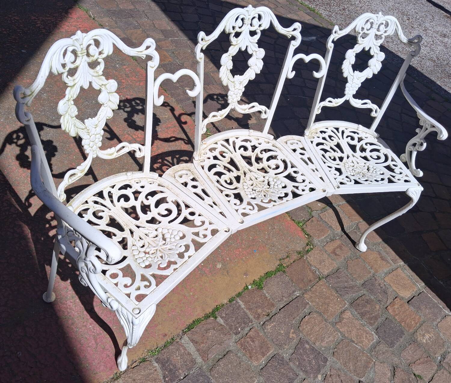 Large terrace or garden bench, made of cast iron, vintage decor.