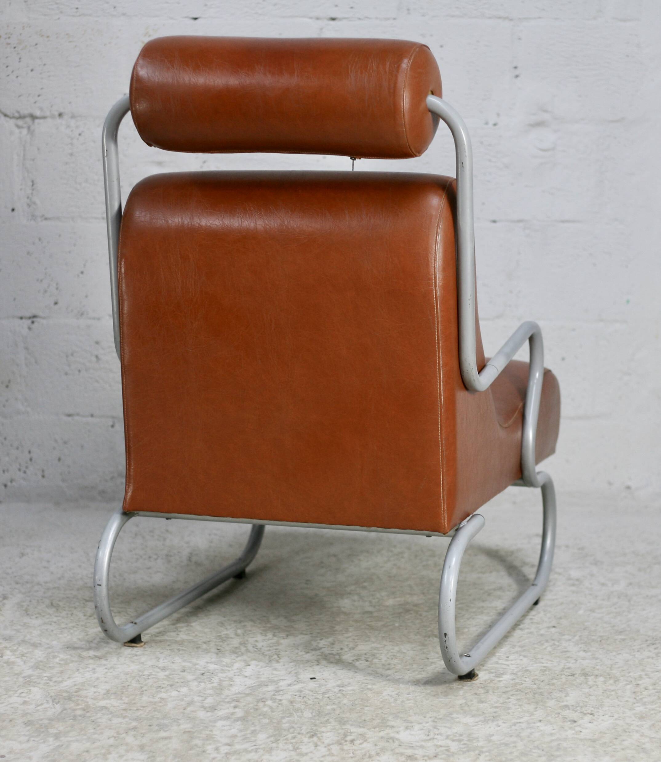 Space age armchair, metal and imitation leather. Circa 1960