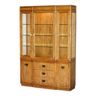 Vintage military display cabinet by Drexel Heritage with lighting and glass shelves.