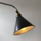 Old industrial wall light that is vintage.