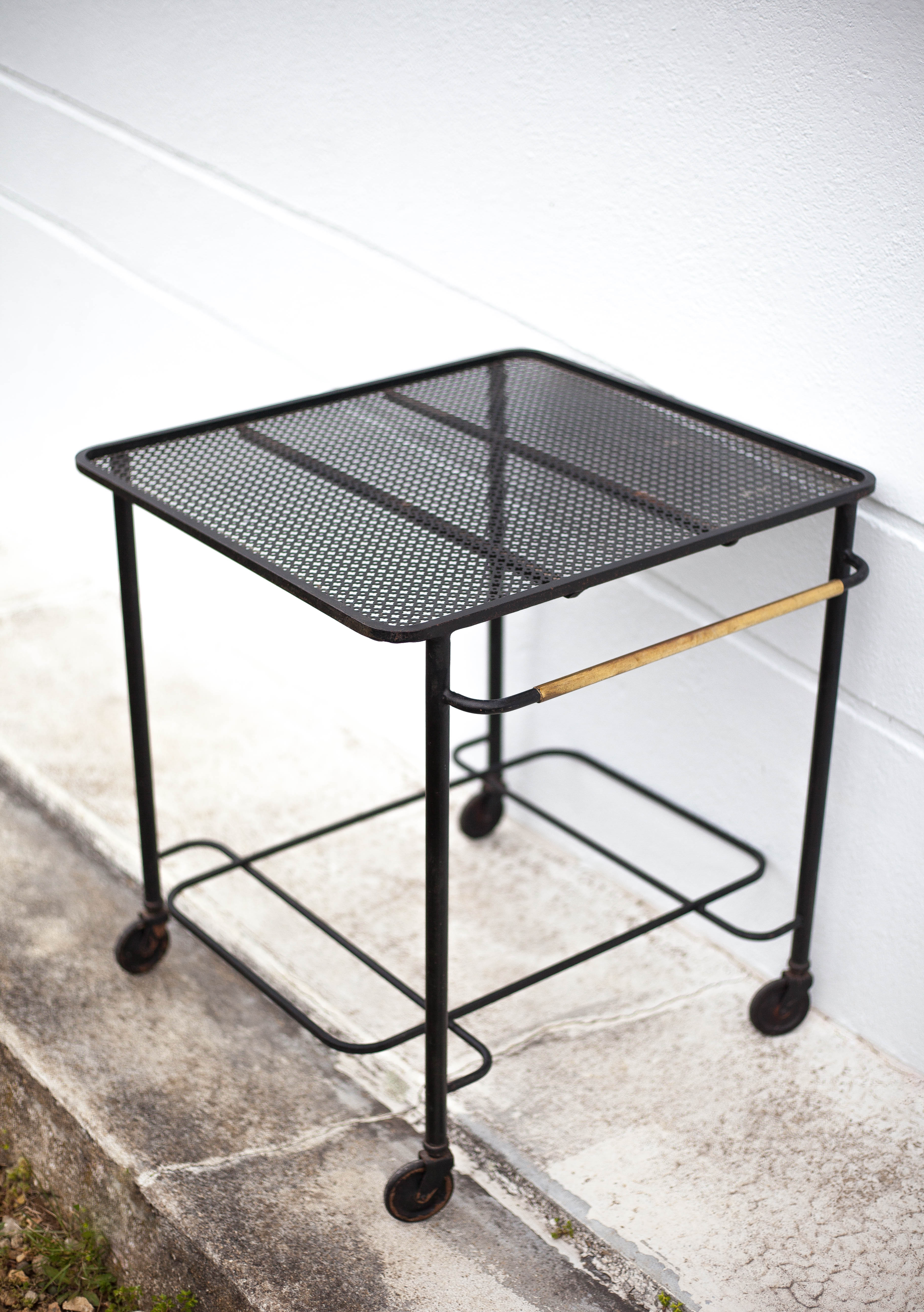 Mathieu Matégot rolling table, steel and brass service, 50s