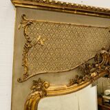 Miroir de style Louis XV en bois et stuc doré XX siècle